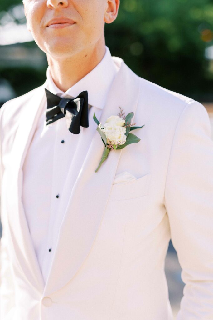 Groom white suit detail